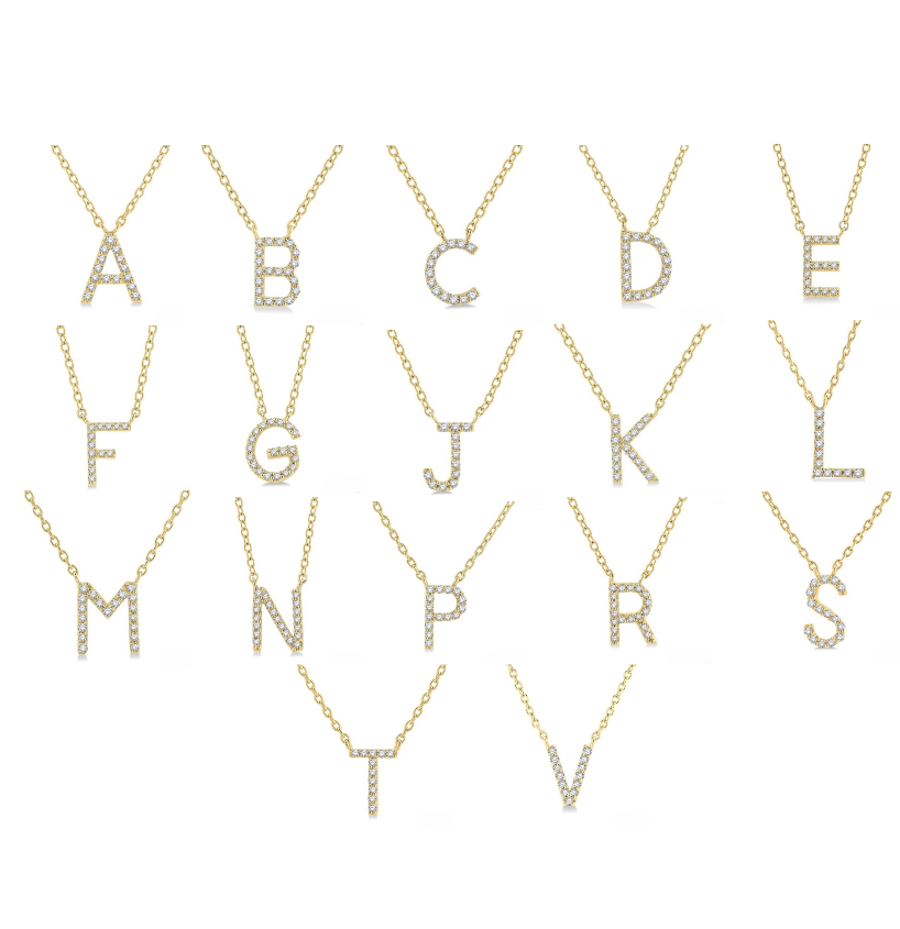 Gold necklaces with letters on a white background